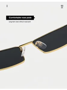 Detailopname van gouden metalen zonnebrilmontuur met zachte neuspads en donker glas