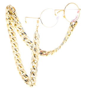 Close-up of golden thick CCB eyeglass chain with non-slip loop on retro round glasses