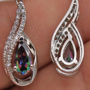 Rainbow topaz teardrop earrings with silver plating and white crystal halo accents