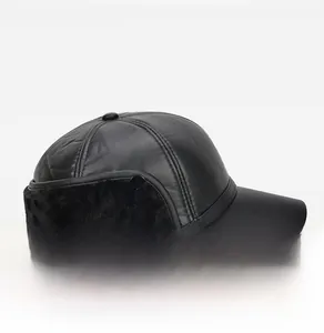 Side view of black leather baseball cap featuring thick faux fur earflaps for winter