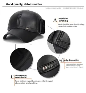 Detail view of black faux leather baseball cap with ear flaps and metal brand plaque