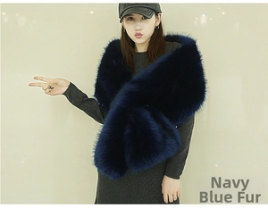 Detail of navy blue faux fox fur shawl with black tips for evening dress and party wear