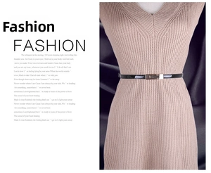 Detail of slim black patent leather belt for women with dual-tone metal buckle on waist