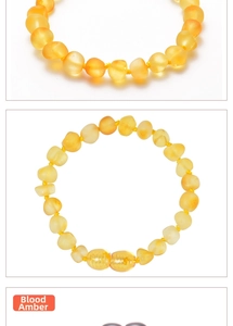 Detailed view of blood amber baby bracelet featuring natural irregular beads in orange hues