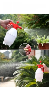 Detail of adjustable brass nozzle showing fine mist and water column spray modes