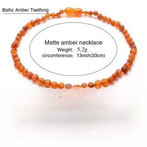 Natural Baltic amber teething necklace for babies in matte orange finish with 33cm length