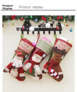 Three-piece Christmas stocking set featuring 3D Santa, Snowman, and Reindeer characters