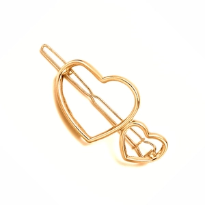 Minimalist gold metal hair clip with hollow heart design for women and girls