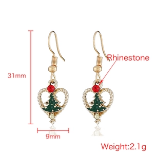 Christmas heart drop earrings with green rhinestones and gold tree design on white background