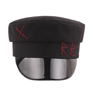 Black wool baker boy hat with faux leather brim and red embroidery detail