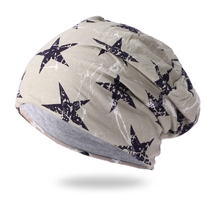 Beige slouchy beanie featuring a vintage star pattern and soft dual-layer knit lining