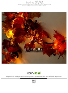 Detailansicht der herbstlichen Ahornblatt-Girlande mit warmen LED-Lichtern
