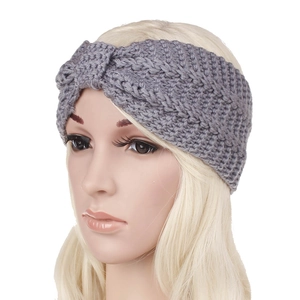 Grey chunky knit headband with twist texture for women on blonde model head