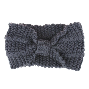 Detailed close-up of dark grey thick knit headband featuring chunky texture and bow shape