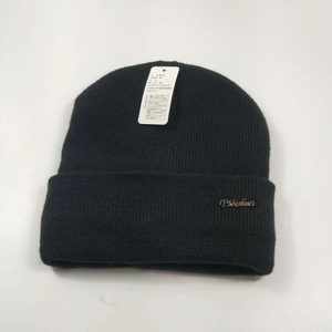 Black ribbed knit beanie with Pikaboo metal logo for winter warmth and outdoor skiing