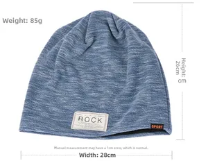 Blue knit beanie with Rock patch showing 28cm width and 26cm height dimensions