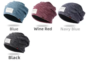 Flat lay of four warm knit beanies with ROCK patch in blue, burgundy, navy, and black