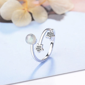Adjustable silver star ring featuring moonstone and sparkling stars for women