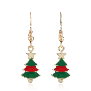 Detail of Christmas tree drop earrings with gold base, red and green enamel and star topper
