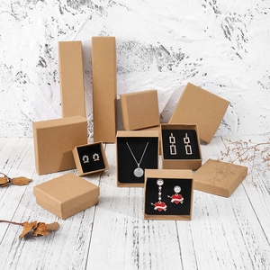 Vintage dark kraft paper jewelry boxes in square and rectangular shapes with sponge inserts
