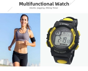 Detail view of water resistant sports watch featuring dual-color design and functional buttons