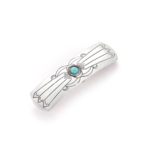 Vintage silver hair clip with turquoise stone and radial geometric engraving