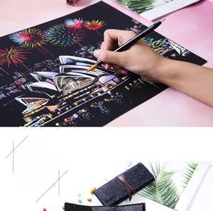 Detail of scratching art tool kit with Sydney Opera House paper and felt storage pouch