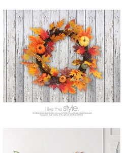 Detail of autumn wreath with maple leaves, small pumpkins and berries on wood background