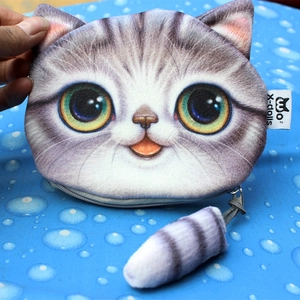 3D printed silver tabby cat coin purse with cute tail zipper on a blue background