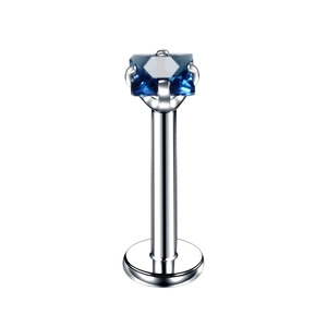 Detail of square blue zircon inlay on silver stainless steel lip piercing stud