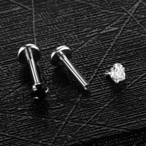 Stainless steel heart labret studs with black and clear cubic zirconia in a four-prong setting