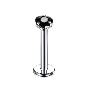 Detail of silver stainless steel labret stud with a faceted black zircon stone inlay
