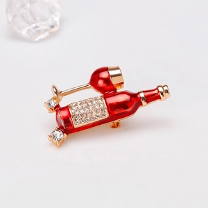 Elegant red wine bottle and glass brooch with gold plating and sparkling crystals