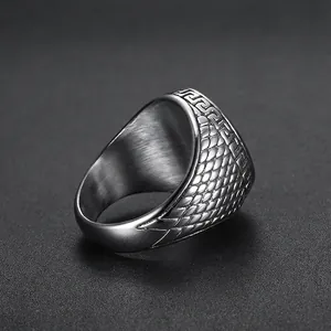 Vintage stainless steel men's ring with dragon scale texture and greek key pattern