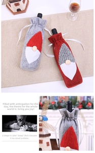 Detail of red and grey Christmas gnome wine bottle covers with knitted texture