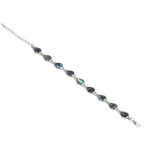 Silver bracelet with ten teardrop colorful abalone shells and lobster clasp on white background