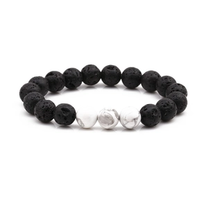 10mm volcanic lava rock and white marble bead bracelet set on a clean white background