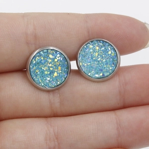 12mm stainless steel stud earrings with blue druzy crystal texture shown on finger