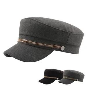 Fashionable navy peaked wool cap with golden chain trim in black and grey colors