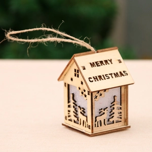 Wooden Christmas house ornament with reindeer cutout and Merry Christmas engraving