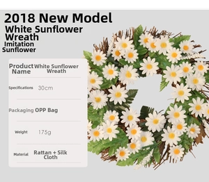 Detail of 30cm white sunflower wreath featuring rattan base and silk flower textures