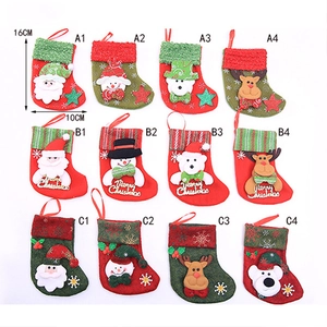 Detailed size chart for assorted 16cm Christmas stockings with Santa and reindeer motifs