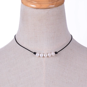 Genuine leather choker necklace featuring five natural freshwater pearls on a black cord