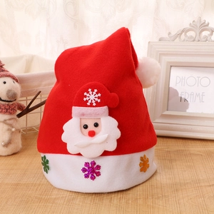 Detail of red felt Christmas hat featuring a 3D Santa Claus and sequined snowflakes