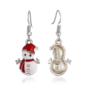 Close-up of cute snowman earrings with red enamel hats and sparkling crystal details