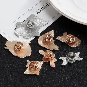 Back view of cartoon bird alloy brooches with silver and rose gold butterfly pin clasps