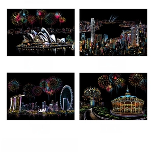 Detail of DIY scratch art kit featuring colorful city landmarks on a black background