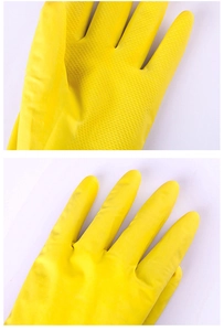 Detail of yellow latex gloves showing anti-slip texture for kitchen cleaning tasks