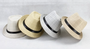 Set of four linen fedora hats in beige yellow grey and brown with black bands