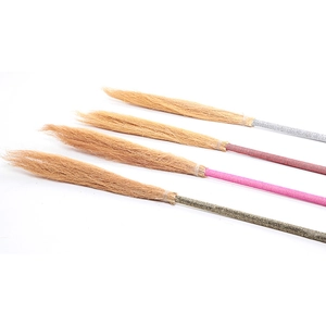 Miniature Halloween witch brooms in four glittery colors for costume parties